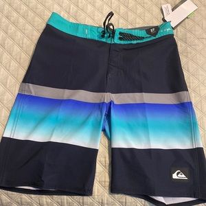 Brand new quicksilver boys board shorts, tags on, never worn, size 14, 27 waist